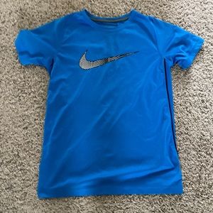 Blue nike shirt, size medium in boys.